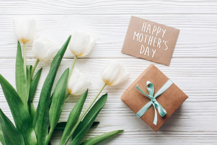 happy mothers day text sign on stylish craft present box and gre