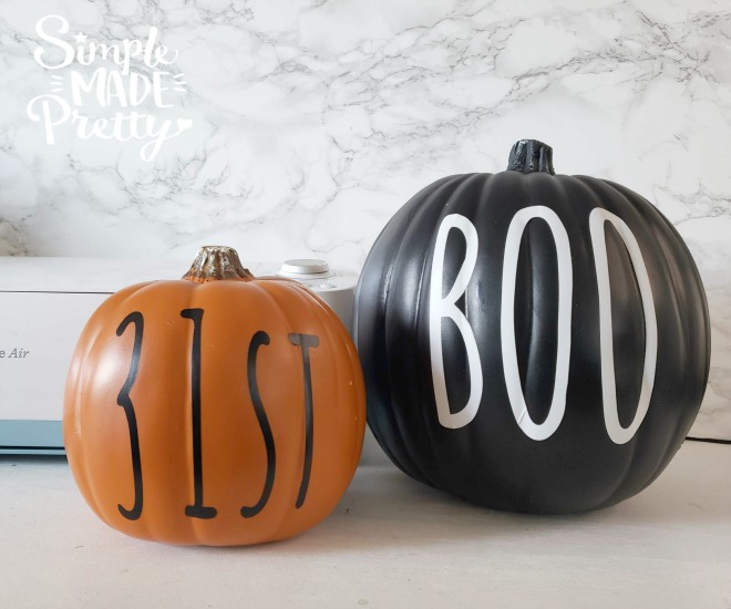 These DIY Rae Dunn Halloween pumpkins are so easy to make using your Cricut Explore or Silhouette Machine! Get the free SVG file now!